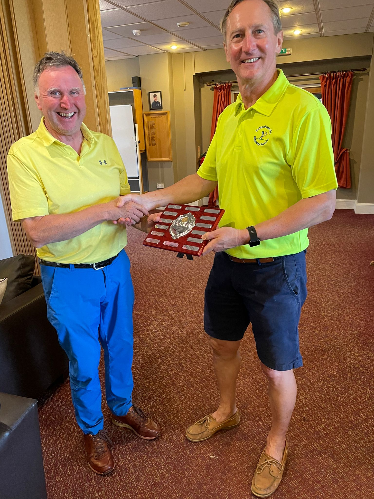 Tim receiving the Tour Trophy from Nigel